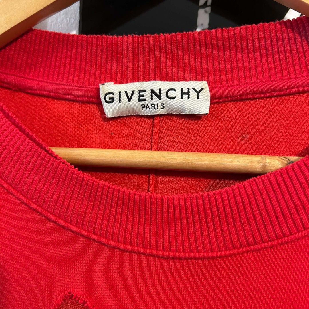 Givenchy Distressed Sweater (Category: Coats, Jackets and Outerwear) located in Quezon City. Submitted by streetwearandluxph (Listing ID 1466559825, Image 2). Description: Givenchy Distressed Sweater.