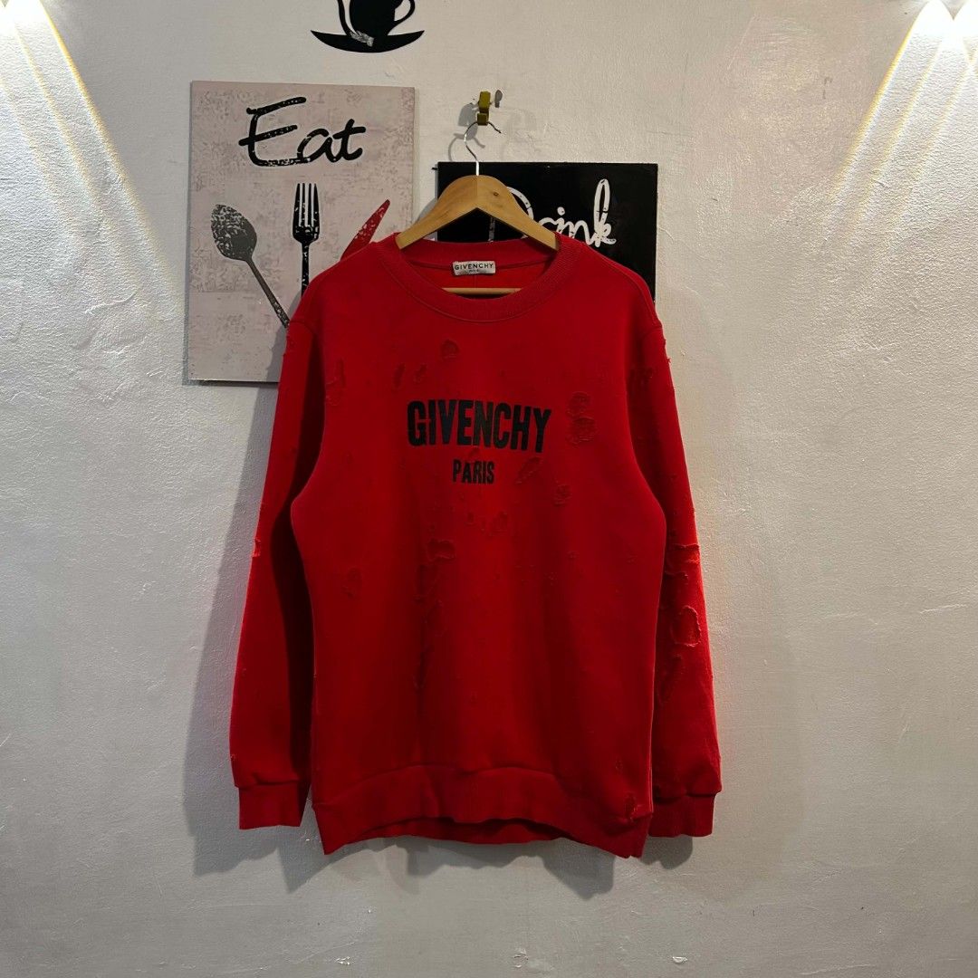 Givenchy Distressed Sweater (Category: Coats, Jackets and Outerwear) located in Quezon City. Submitted by streetwearandluxph (Listing ID 1466559825, Image 1). Description: Givenchy Distressed Sweater.