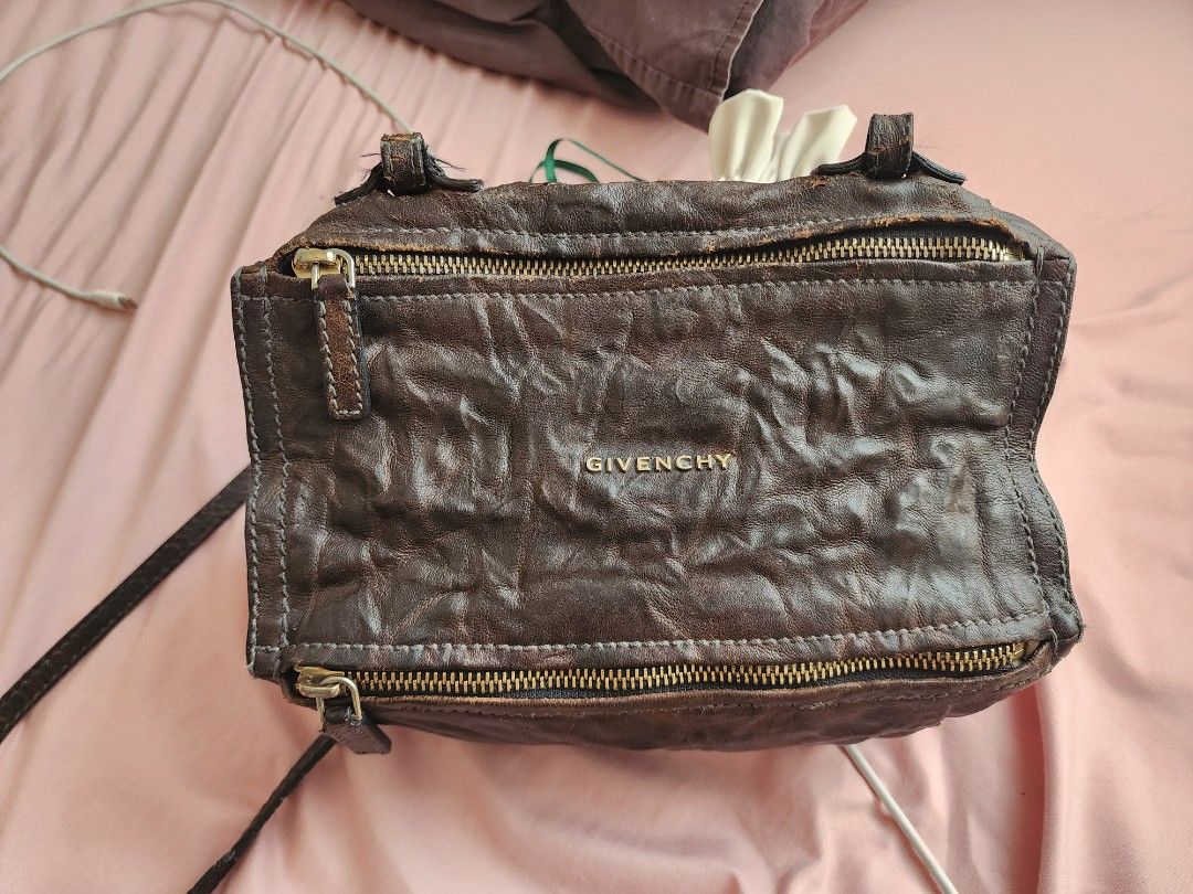 Givenchy Pandora Mini (Category: Luxury Bags & Wallets) located in Taytay. Submitted by hnwuttttt (Listing ID 1466455341, Image 1). Description: Givenchy Pandora Mini Sheepskin Leather Well used. Leather cracks especially on strap..