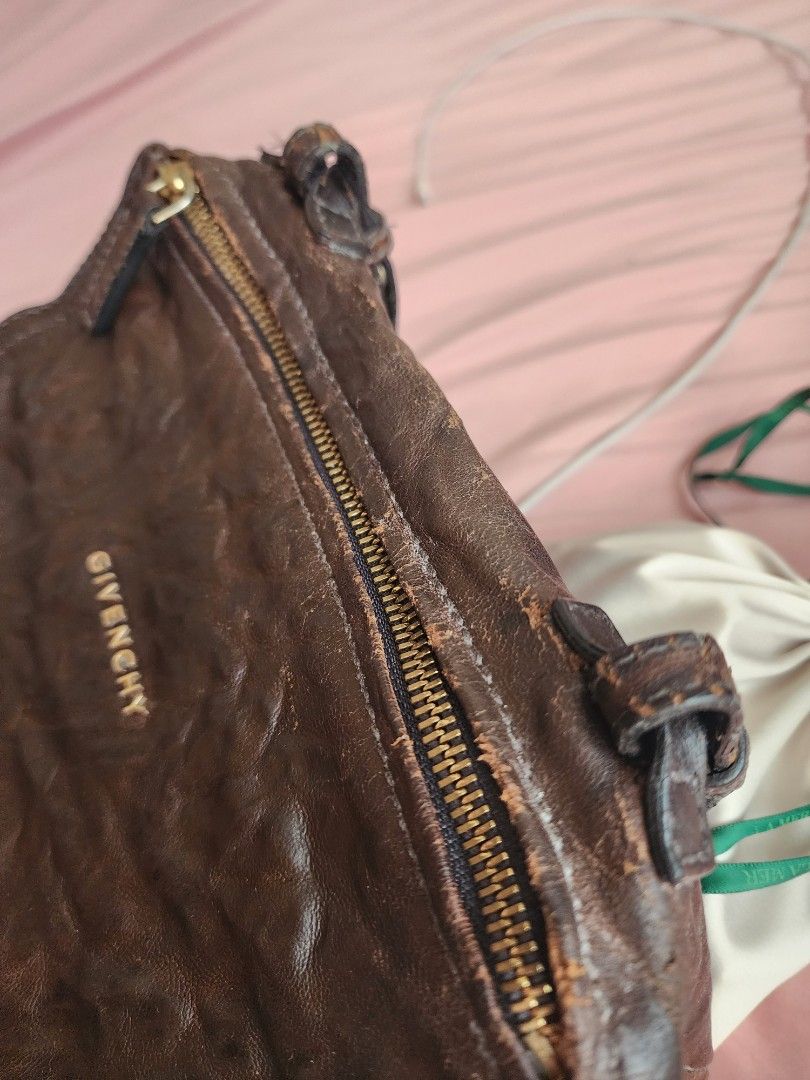 Givenchy Pandora Mini (Category: Luxury Bags & Wallets) located in Taytay. Submitted by hnwuttttt (Listing ID 1466455341, Image 2). Description: Givenchy Pandora Mini Sheepskin Leather Well used. Leather cracks especially on strap..