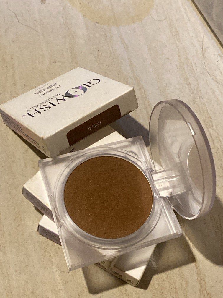 Glowish by HudaBeauty luminous pressed powder bronzer (Category: Makeup) located in Paranaque City. Submitted by veibi3 (Listing ID 1466357752, Image 2). Description: 2 shades avail 3 piece avail Super nice bronzy shimerry shade.