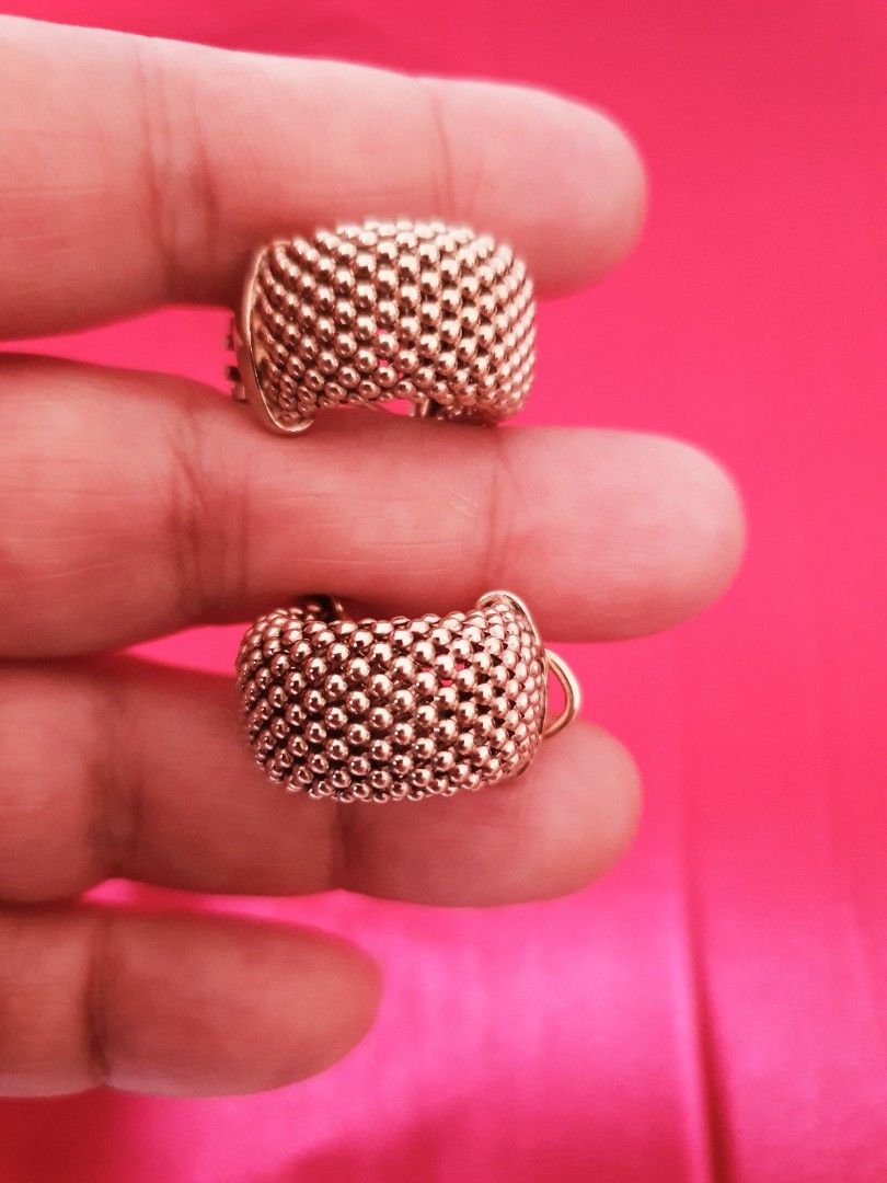 Gold Textured Hoop Earrings (Category: Earrings) located in Binangonan. Submitted by everythingmustgo78 (Listing ID 1466409575, Image 1). Description: - gold tone huggie hoop earrings - Textured bead cluster surface on the outer half - Chunky dome profile that catches the light beautifully - Secure post-back closure with stamped hallmark near the hinge.