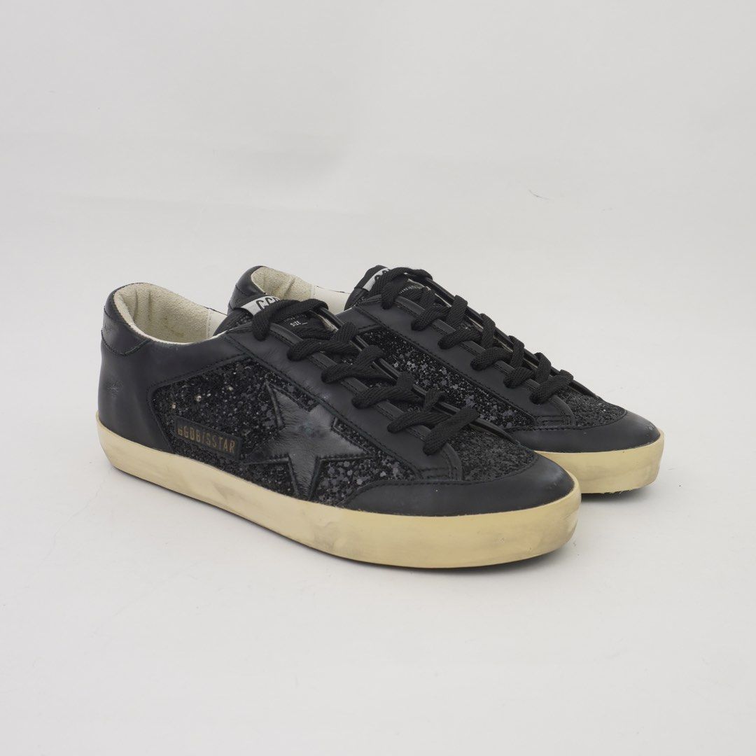 Golden Goose Black Glitter Super-Stat (Category: Sneakers & Footwear) located in Taguig. Submitted by dluxenest (Listing ID 1466353164, Image 1). Description: Last price posted Inclusion: dust bag You may follow us on IG : dluxenest FB : Dragons Luxe Nest.