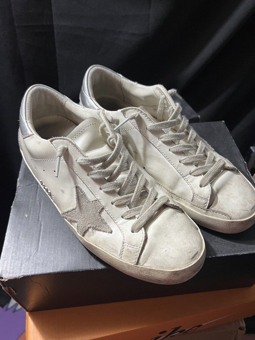 Golden Goose (silver tab) (Category: Sneakers) located in San Juan City. Submitted by sheluvsme55 (Listing ID 1466530235, Image 1). Description: - Golden Goose Deluxe Brand - Authentic Leather - Great Condition - Only issue is star is missing - Size 40!!!.