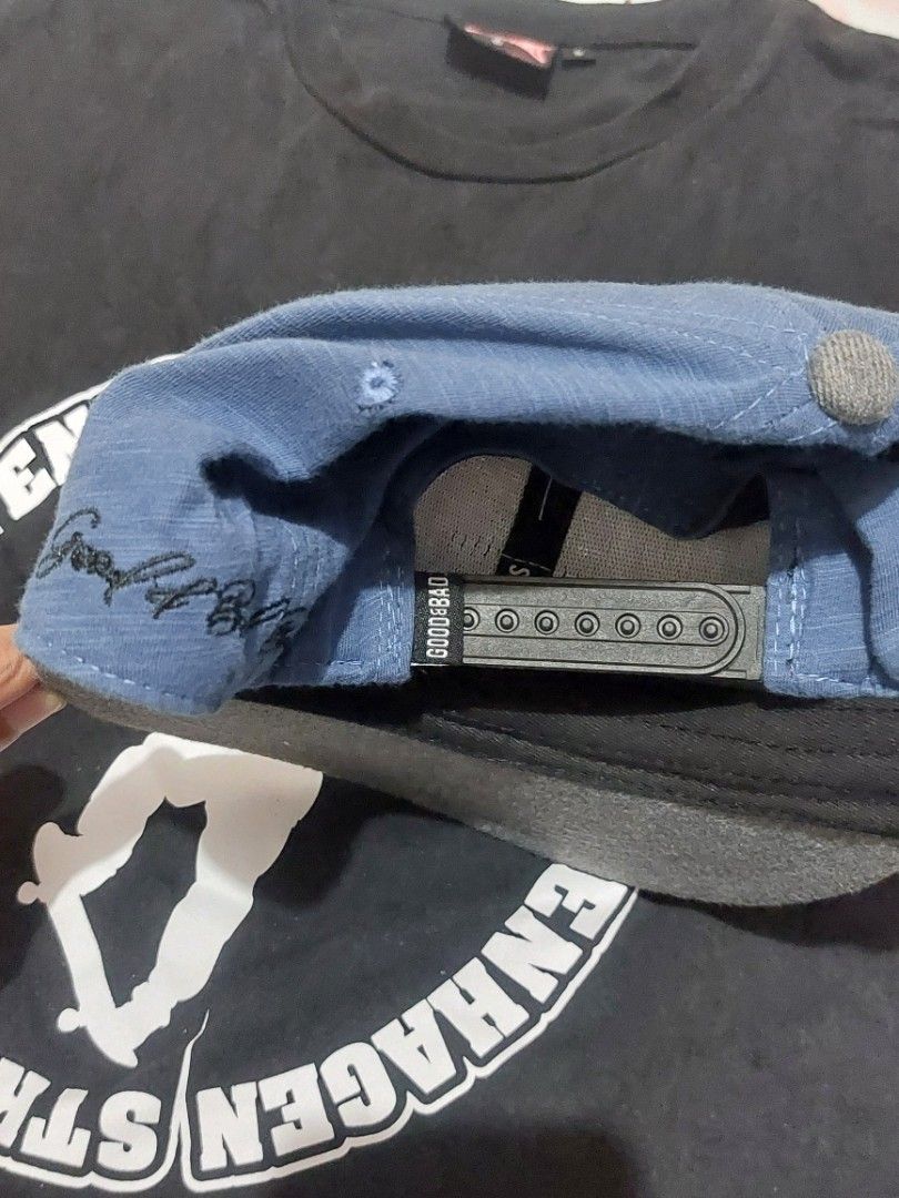 Good & Bad Snapback Cap Blue Grey (Category: Caps & Hats) located in Sorsogon. Submitted by johnsarchive.ph (Listing ID 1466523635, Image 3). Description: - Color: Blue and Grey - Design: Structured crown with a flat brim - Fit: Adjustable plastic strap at the back - Details: Interior taping branded with 'Find Balance' - Condition: Clean fabric inside and out - Style: Great everyday hat that goes with almost anything.