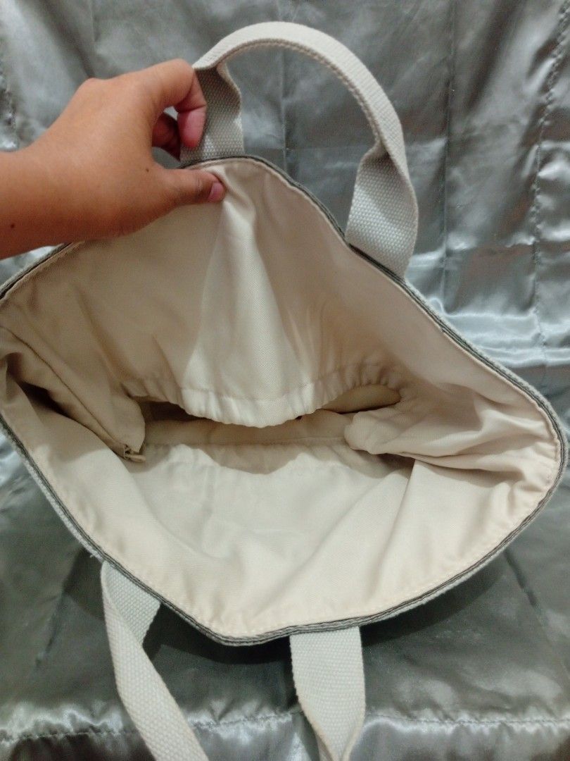 Gray and white tote bag handbag (Category: Tote Bags) located in Valenzuela. Submitted by bakisbox (Listing ID 1466456701, Image 3). Description: Items description: ‎ ‎Condition: like new ‎Price: 350 ‎(Negotiable) ‎ ‎Note: expect our items to have minimal flaws such as dent, scratched, chips. Due to its second hand nature or damage items from malls and or shops, here we have "AS IS" basis ‎ ‎Method of shipping: ‎ ‎SAME DAY DELIVERY ‎(Along QC, Va