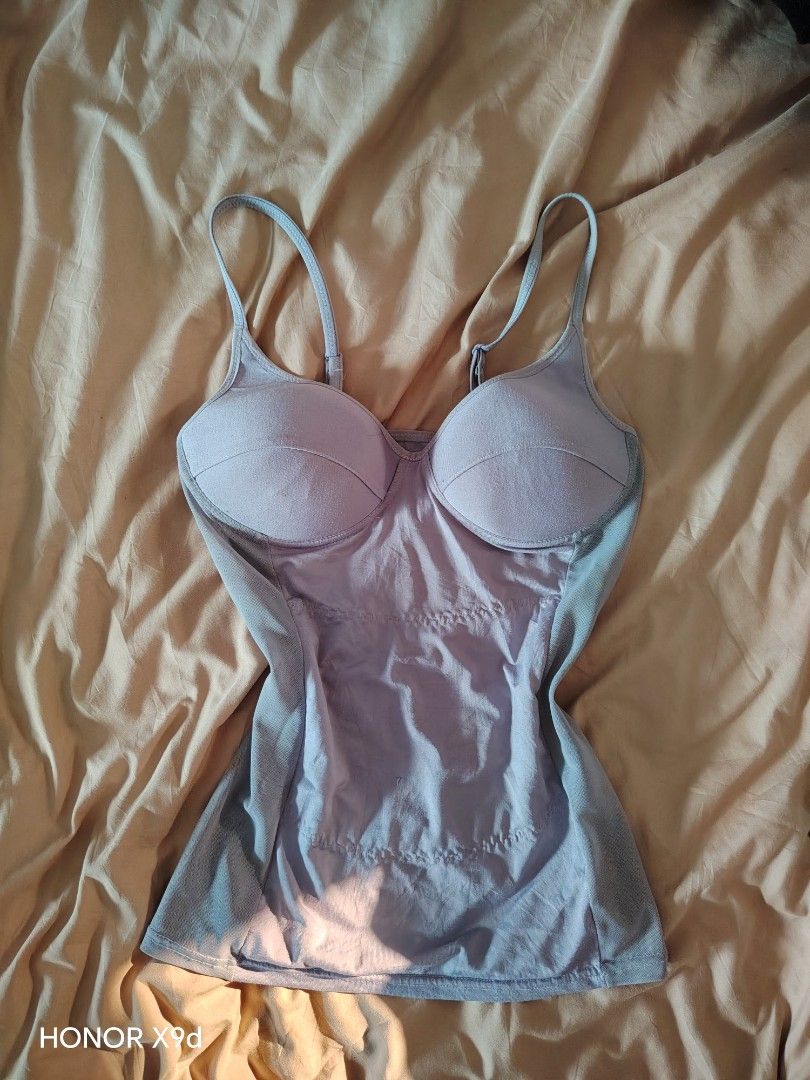 Gray Padded Camisole Shaping Top (Category: Sleeveless) located in Mabalacat. Submitted by Jackikay.PreLoved (Listing ID 1466434010, Image 1). Description: LAKAS MAKA SEXY NITO! Shapewear - Size: XL on tag but fits S-M - Color: Gray /Super light purple - Built-in padded bra cups for extra support - Adjustable straps for a custom fit - Mesh panels at sides and back for breathability - Smooth front panel with subtle contour stitching.