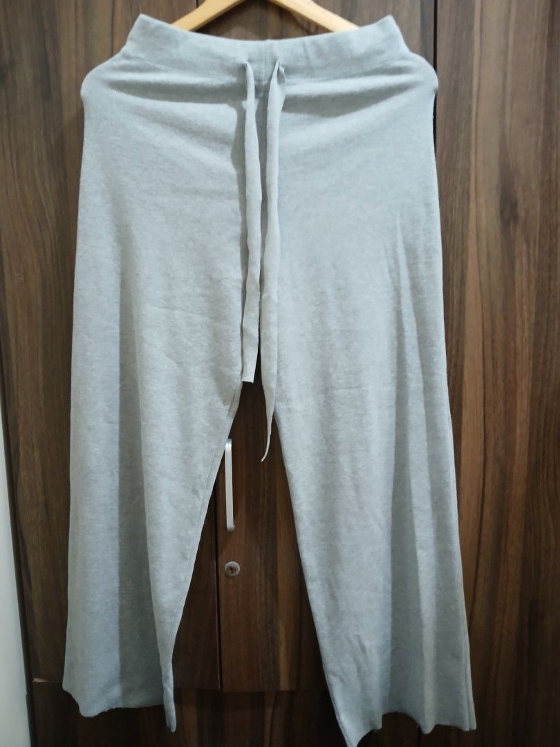 Grey Ribbed Lounge Pants with Drawstring Waist (Category: Other Bottoms) located in Manila. Submitted by relaxlang (Listing ID 1466399511, Image 1). Description: - Waist 26 to 30 / Length 38 - Color: Grey - Material: Soft textured ribbed fabric - Fit: Relaxed straight-leg cut - Waistband: Adjustable drawstring for maximum comfort - Versatility: Ideal for home lounging or casual errands - Condition: Brand new/Excellent.