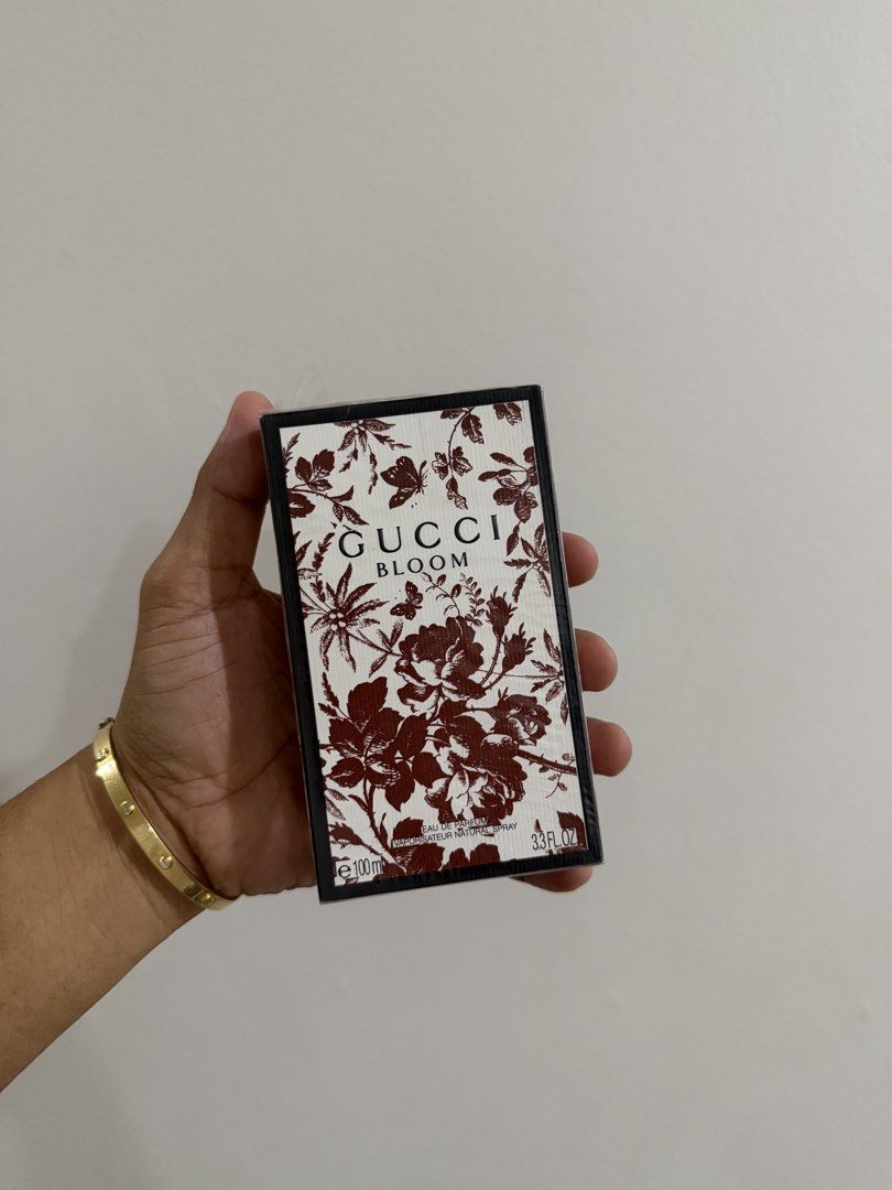Gucci Bloom Eau de Parfum 100ml (Category: Fragrance & Deodorants) located in Manila. Submitted by coachphilippines__ (Listing ID 1466509930, Image 1). Description: - Brand: Gucci Bloom Eau de Parfum - Size: 100ml / 3.3 fl. oz. - Condition: Brand new, completely unopened and untouched - Packaging: Comes in original black and white floral box, tightly wrapped in clear protective plastic film - Perfect for gifting or upgrading your personal fragran