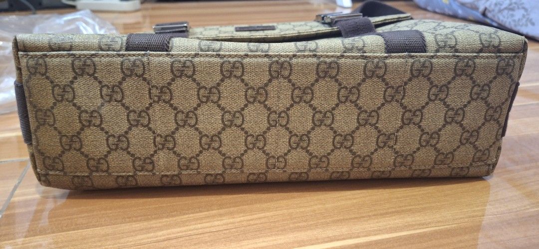 Gucci GG Supreme Messenger Bag (Category: Sling Bags) located in Quezon City. Submitted by maya4jeremiah (Listing ID 1466504367, Image 3). Description: - Authentic Gucci messenger bag in classic GG monogram coated canvas - Features durable brown leather trim and an adjustable canvas shoulder strap - Front flap closure with secure metal hardware clips and branded buckles - Spacious interior compartment, ideal for daily essentials or school use - C