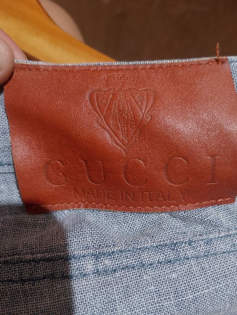 Gucci Grey Cotton Blend Shorts Size 30-32 (Category: Shorts) located in Cavite. Submitted by marvzclothing (Listing ID 1466431480, Image 3). Description: - Brand: Gucci - Size: 30-32 - Material: Cotton & elastane blend (Made in Italy) - Color/Pattern: Clean light blue-grey weave - Features: Logo-embossed button closure, branded hardware, back pockets, and interior designer labels - Condition: Excellent, well-maintained.