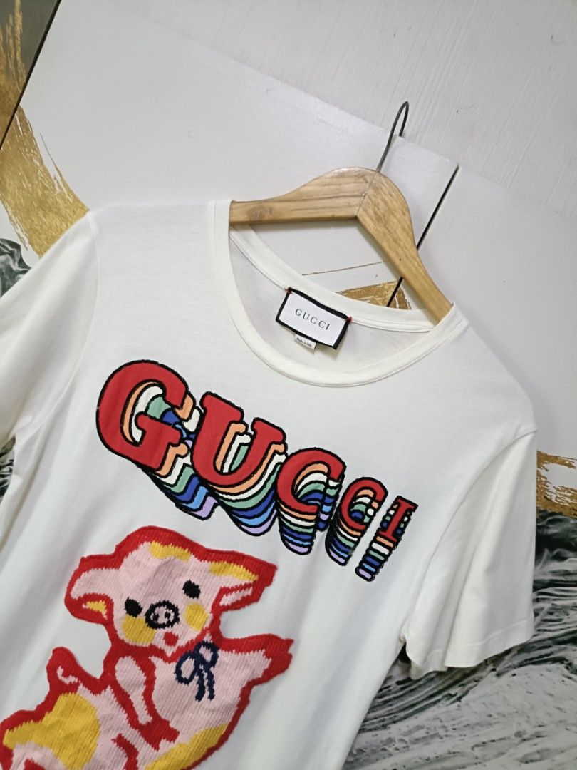 Gucci Gucci Piglet pattern embroidered (Category: Luxury Apparel) located in Magalang. Submitted by itskate_cc (Listing ID 1466461915, Image 3). Description: Gucci Gucci Piglet pattern embroidered Actual size using inches Waistline /Widht 18 Lenght/27 fittings is LARGE Excellent Condition, Issue:0 Message if you have any other question about sizing. We do shipping nation wide I'm also open for video call so that you can see the item you 're inter
