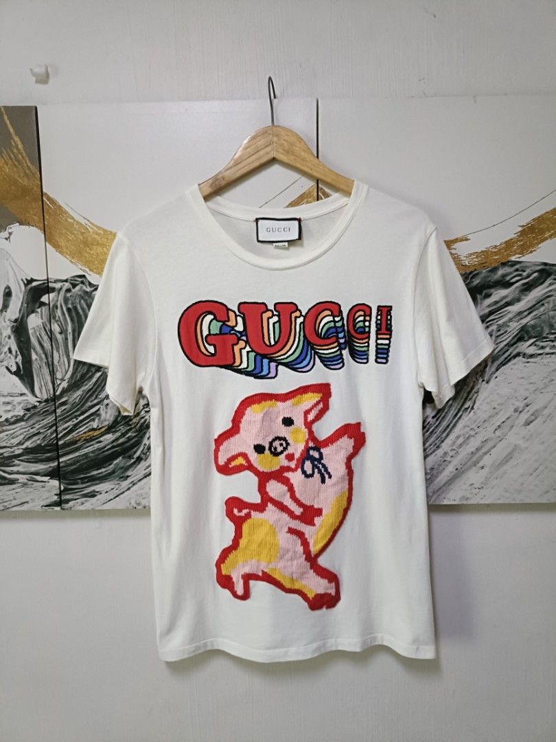Gucci Gucci Piglet pattern embroidered (Category: Luxury Apparel) located in Magalang. Submitted by itskate_cc (Listing ID 1466461915, Image 2). Description: Gucci Gucci Piglet pattern embroidered Actual size using inches Waistline /Widht 18 Lenght/27 fittings is LARGE Excellent Condition, Issue:0 Message if you have any other question about sizing. We do shipping nation wide I'm also open for video call so that you can see the item you 're inter