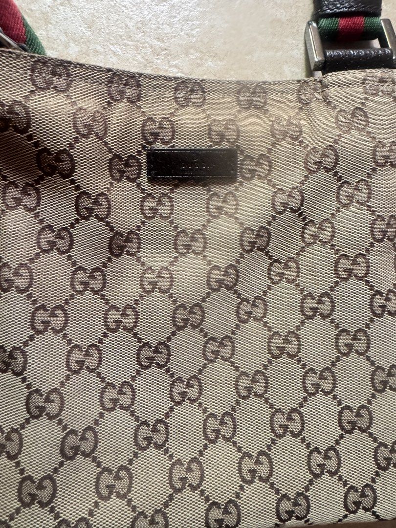 GUCCI sling bag (Category: Cross-body Bags) located in Bulacan. Submitted by young.mind (Listing ID 1466389219, Image 2). Description: EUC authentic GUCCI sling / bodybag from Dubai.