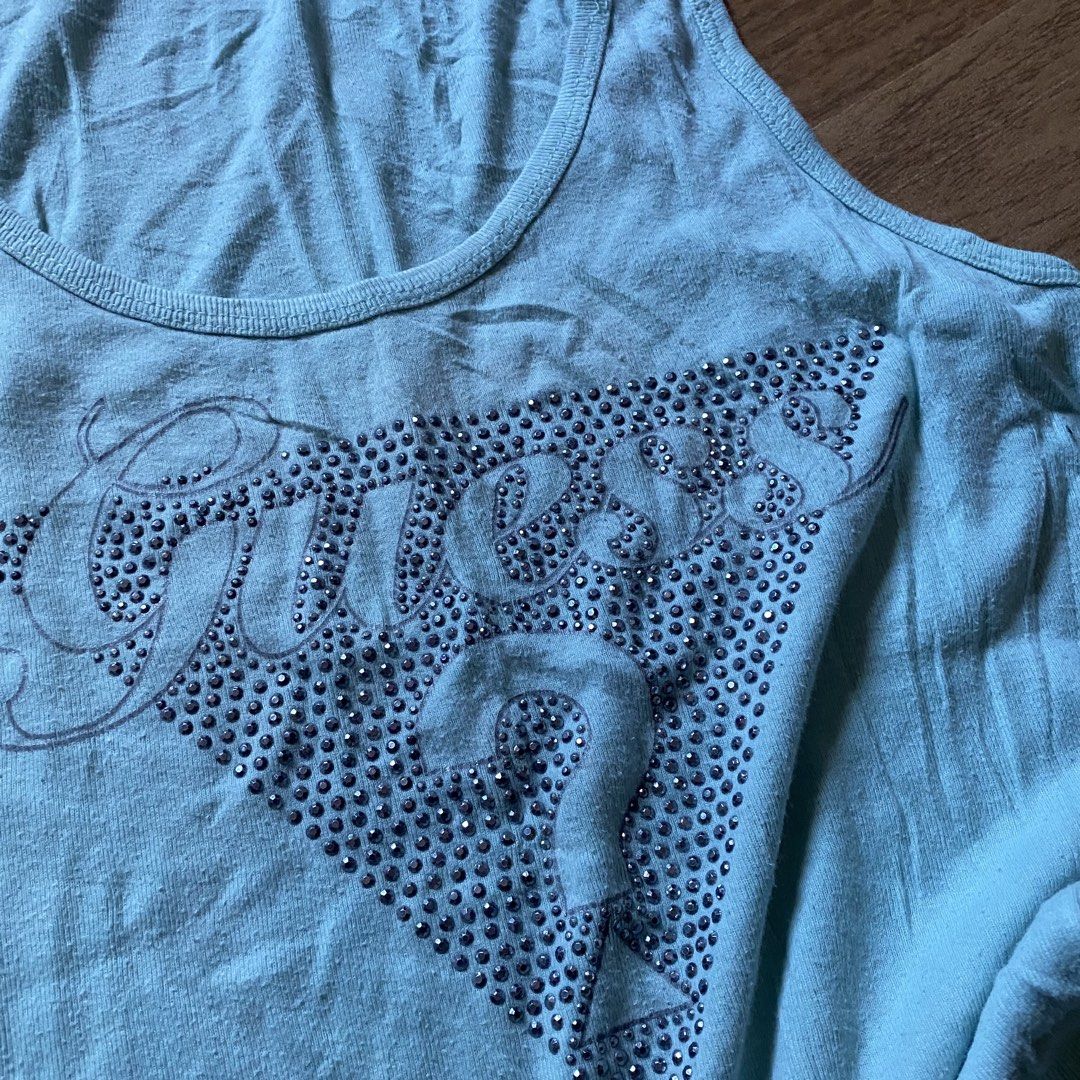 Guess tank top (Category: Sleeveless) located in Paete. Submitted by fat.archives (Listing ID 1466386492, Image 2). Description: Dimes Bust 15 Length 24 +sf.
