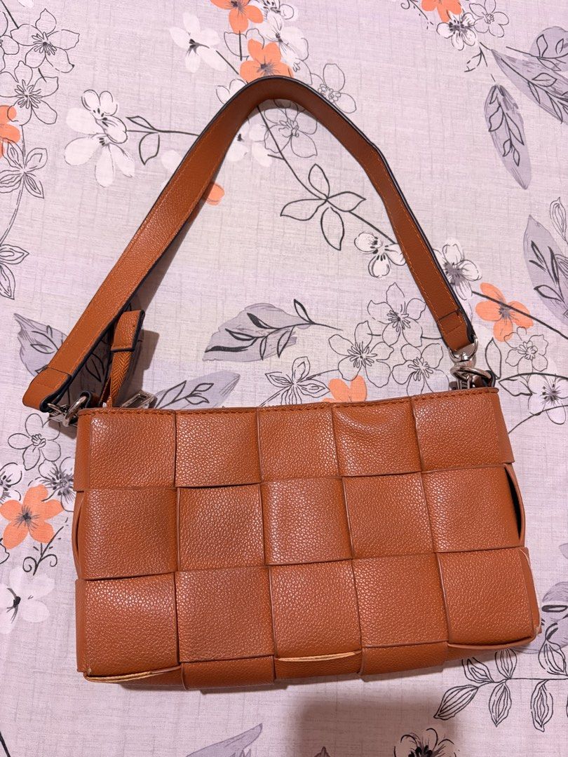 Guess Woven Brown Shoulder Bag (Category: Shoulder Bags) located in Manila. Submitted by julesbanares (Listing ID 1466469370, Image 2). Description: FOR SALE: Guess Woven Shoulder Bag (comes with another strap for sling bag) - used but not abused (maalaga po ako sa bag) - no damages - zippers are all working - original, bought from GUESS RFS: decluttering.