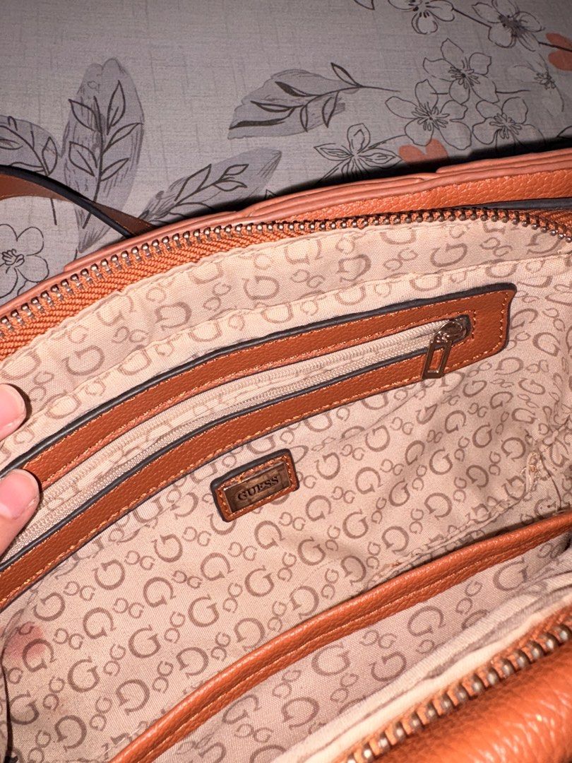 Guess Woven Brown Shoulder Bag (Category: Shoulder Bags) located in Manila. Submitted by julesbanares (Listing ID 1466469370, Image 3). Description: FOR SALE: Guess Woven Shoulder Bag (comes with another strap for sling bag) - used but not abused (maalaga po ako sa bag) - no damages - zippers are all working - original, bought from GUESS RFS: decluttering.