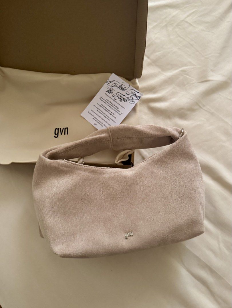 GVN Suede Midi Shoulder Bag (Category: Shoulder Bags) located in Manila. Submitted by kirstengaab (Listing ID 1466503728, Image 1). Description: - Brand: GVN - Style: midi sized suede shoulder bag - Color: sand - no box included - dm me for more details .