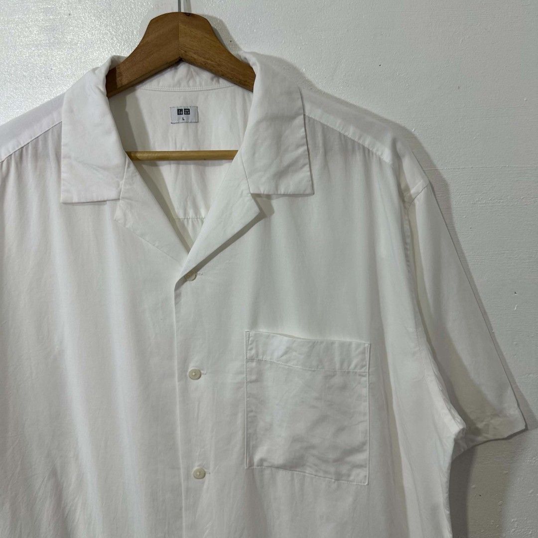 #H891 Uniqlo Open Collar Button Polo (White) (Category: Activewear) located in Tagum. Submitted by eightrags (Listing ID 1466542848, Image 2). Description: #H891 Uniqlo Open Collar Button Polo (White) XL 24 W 29.5 L Good as new condition 500.