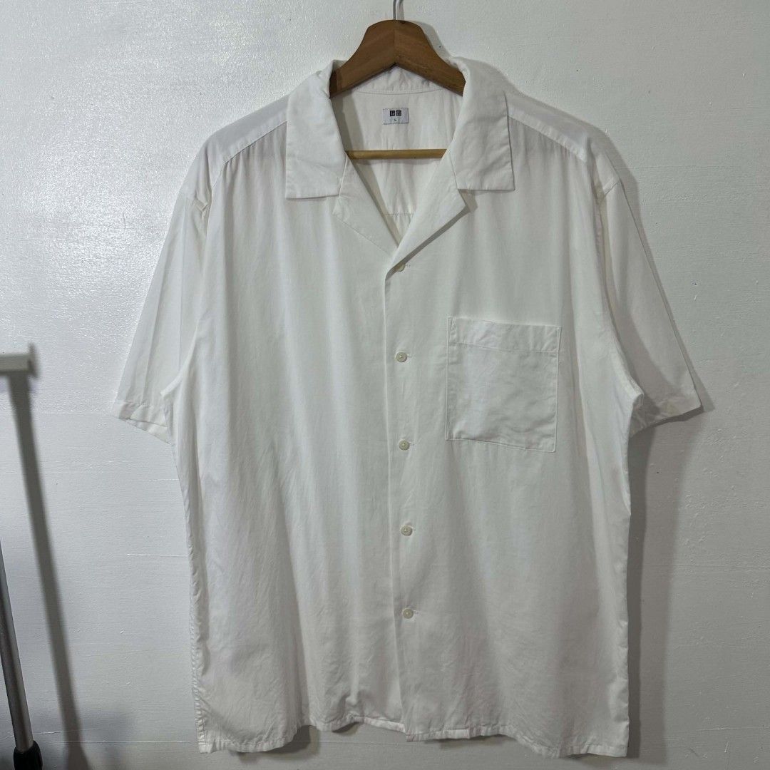 #H891 Uniqlo Open Collar Button Polo (White) (Category: Activewear) located in Tagum. Submitted by eightrags (Listing ID 1466542848, Image 1). Description: #H891 Uniqlo Open Collar Button Polo (White) XL 24 W 29.5 L Good as new condition 500.