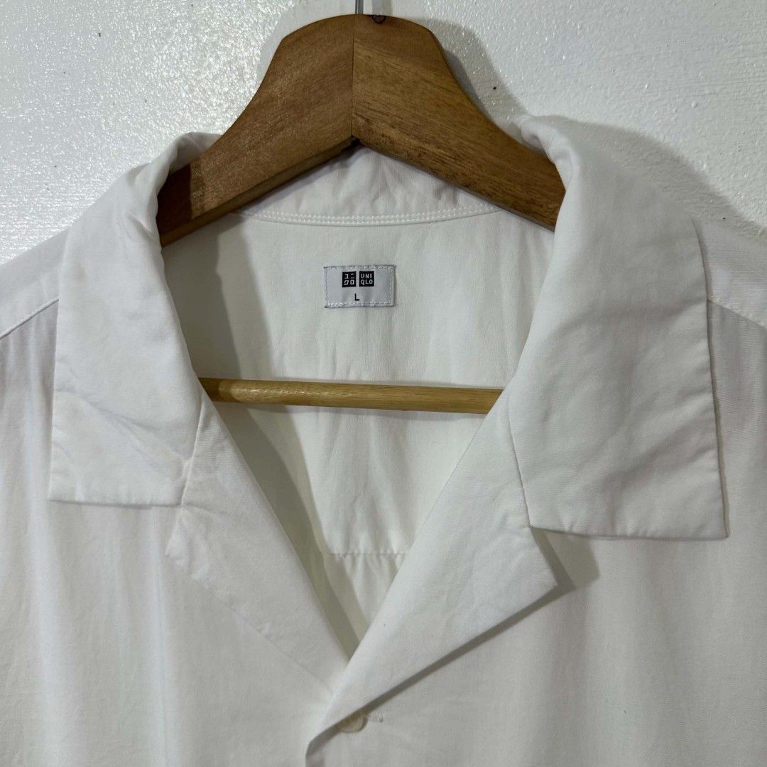 #H891 Uniqlo Open Collar Button Polo (White) (Category: Activewear) located in Tagum. Submitted by eightrags (Listing ID 1466542848, Image 3). Description: #H891 Uniqlo Open Collar Button Polo (White) XL 24 W 29.5 L Good as new condition 500.