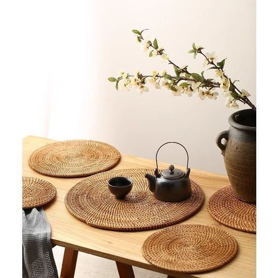 Hand Woven Rattan Placemat Coaster Set Dinnerware with Holder (Category: Dinnerware & Cutlery) located in Manila. Submitted by winterbliss (Listing ID 1466459094, Image 2). Description: Thickness: 1cm Size (Diameter): - 8 cm , 8g - 10 cm , 17g - 16 cm , 41g - 20 cm , 60 - 30 cm - 35 cm - 30x40 cm Available : - per pc - sets (6 coasters + 1 coaster organizer) Description: - Handwoven round rattan placemats and cup coasters - Natural straw brown co