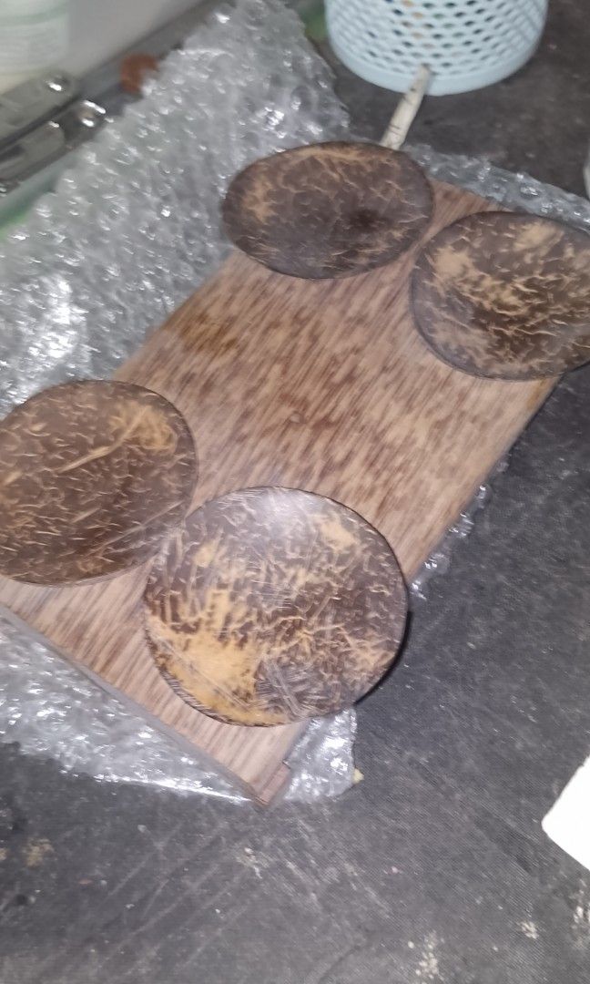 Handcrafted Coconut Shell Appetizer Platter/Home Decor (Category: Handmade Craft) located in Quezon City. Submitted by akosiluna44 (Listing ID 1466549159, Image 1). Description: pre-owned made from polished coconut shells (bao Ng niyog) which are mounted onto a flat plank of rustic palm wood or hardwood Pica-Pica/Appetizer Platter - can be used in tropical or eco-friendly dining setups to serve small finger foods such as peanuts, nuts or candies 