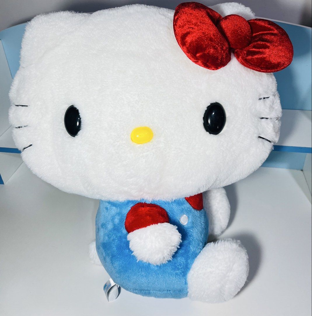 hello kitty large plushie (Category: Plushies & Soft Toys) located in Cainta. Submitted by jjsp_monsterhunting (Listing ID 1466430671, Image 1). Description: hello kitty large plushie approx 20 inches sega sanrio brand tag meet up pin loc cainta shipping options LALAMOVE✅ JNT✅.