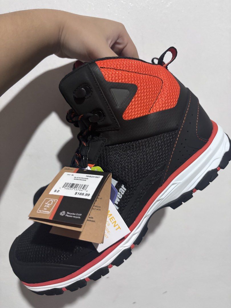 Helly Hansen Workwear Safety Boots Black Orange Size 9 (Category: Boots) located in Manila. Submitted by shieshieee (Listing ID 1466563055, Image 2). Description: - Brand: Helly Hansen - Style: High-top workwear boots - Color: Black and orange - Size: US 9 - Condition: Brand new, never worn, pristine condition with original tags still attached - Features: Durable mesh and protective toe cap .