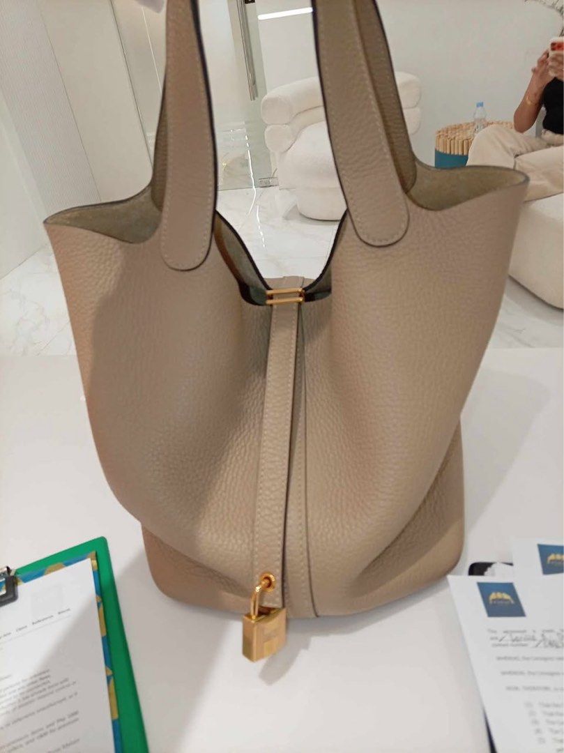 Hermes Picotin 22 in Trench (Category: Luxury Bags & Wallets) located in Marikina City. Submitted by lar.luxury (Listing ID 1466389228, Image 1). Description: Complete with dust bag, box, copy of the receipt, authenticity card.