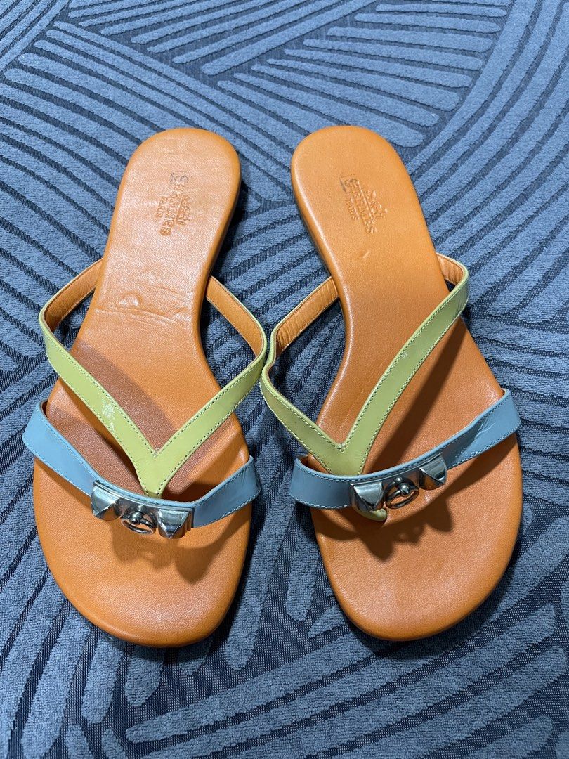 Hermès Corfu Sandals Size 35.5 Multi-color (Category: Sandals) located in Calapan. Submitted by lucasthrifts (Listing ID 1466561947, Image 1). Description: - Brand: Hermès - Model: Corfu Sandals - Size: 35.5 - Colorway: Multi-color (Orange footbed, yellow straps, light blue front strap) - Hardware: Silver-tone - Material: Leather upper and soles - Origin: Made in Spain - Style: Slip-on - Condition: Normal signs of wear on the soles; Hermes Paris 