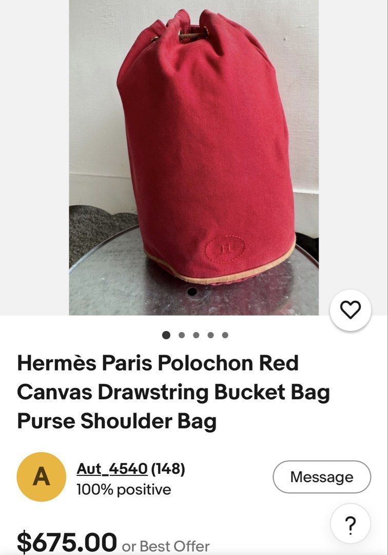 Hermès Paris Polochon Red Canvas Drawstring Bucket Bag (Category: Cross-body Bags) located in Cebu City. Submitted by xoxoxo888marco (Listing ID 1466533826, Image 2). Description: - Brand: Hermès Polochon Drawstring Bucket Bag - Color/Material: Striking red canvas with tan leather base trim and drawstring cords - Hardware: Gold-tone grommets with debossed front Hermès logo - Shape: Structured cylinder silhouette - Versatility: Can be worn over th