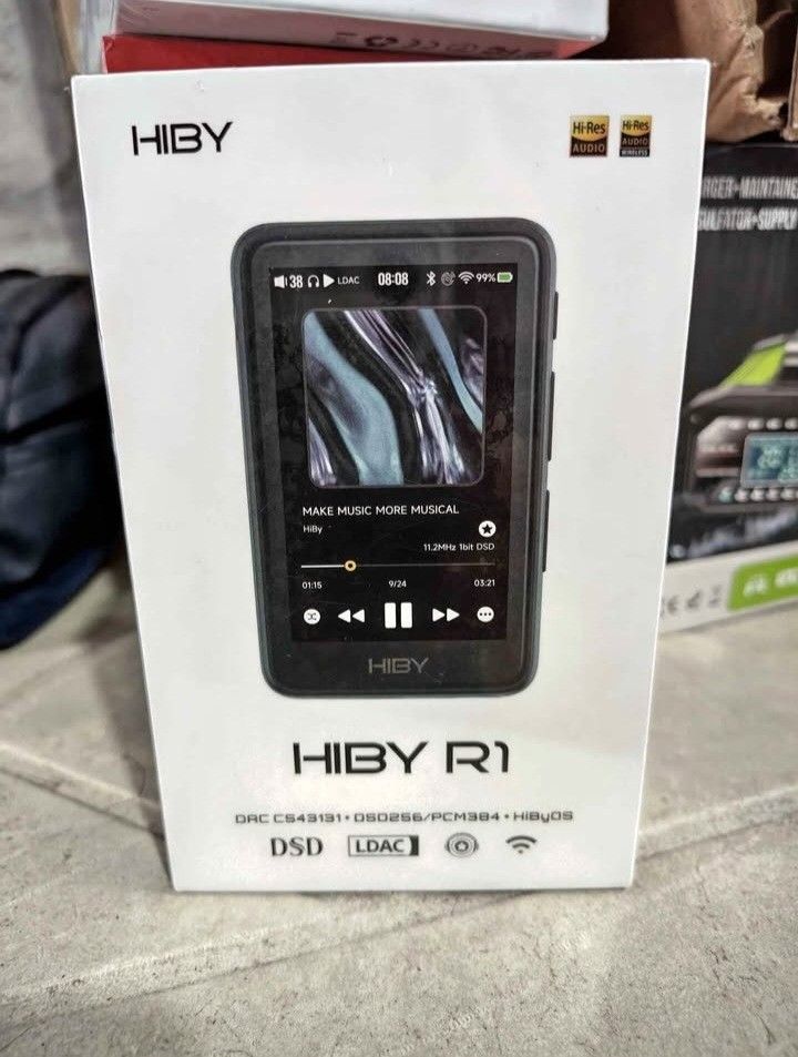 HiBy R1 High Resolution Music Player (Category: Portable Music Players) located in Dasmarinas. Submitted by zildthereaper (Listing ID 1466440534, Image 1). Description: - Model: HiBy R1 Portable High-Resolution Music Player - Color: Black - DAC: CS43131 for superior audio quality - OS: HiByOS - Audio Support: DSD256 and PCM384 - Connectivity: Built-in WiFi and LDAC Bluetooth streaming - Condition/Inclusions: Comes with original retail box and pro