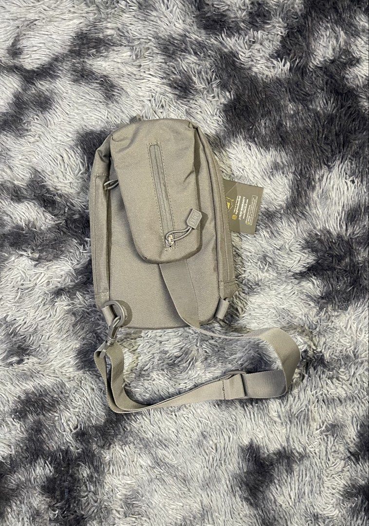 tactical bag (Category: Sling Bags) located in Caba. Submitted by thriftedpopcorn (Listing ID 1466435108, Image 3). Description: highland tactical Molle Webbing sling bag (REX) dimentions: length:12 inches width:9 inches multipocket from US balikbayan box over all condi: good as new 1k plus sf 💰mop:gcash/maribank 📦mod:jnt 📍location: san fernando la union.