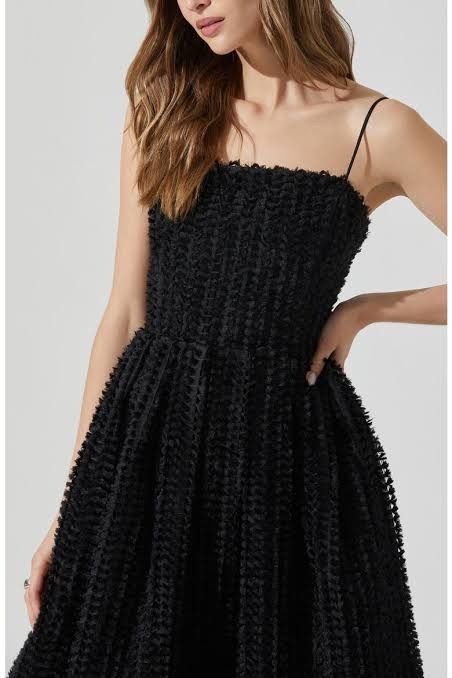 H&M Black Textured Square Neck Dress (Category: Dresses) located in Manila. Submitted by caeln (Listing ID 1466526269, Image 2). Description: - Brand: H&M - Style: Black midi dress with all-over textured pattern, square neckline, and spaghetti straps - Fit: Flattering flared skirt shape - Size: EUR 40 / US 8 (equivalent to US Medium) - Condition: Worn once, no flaws.