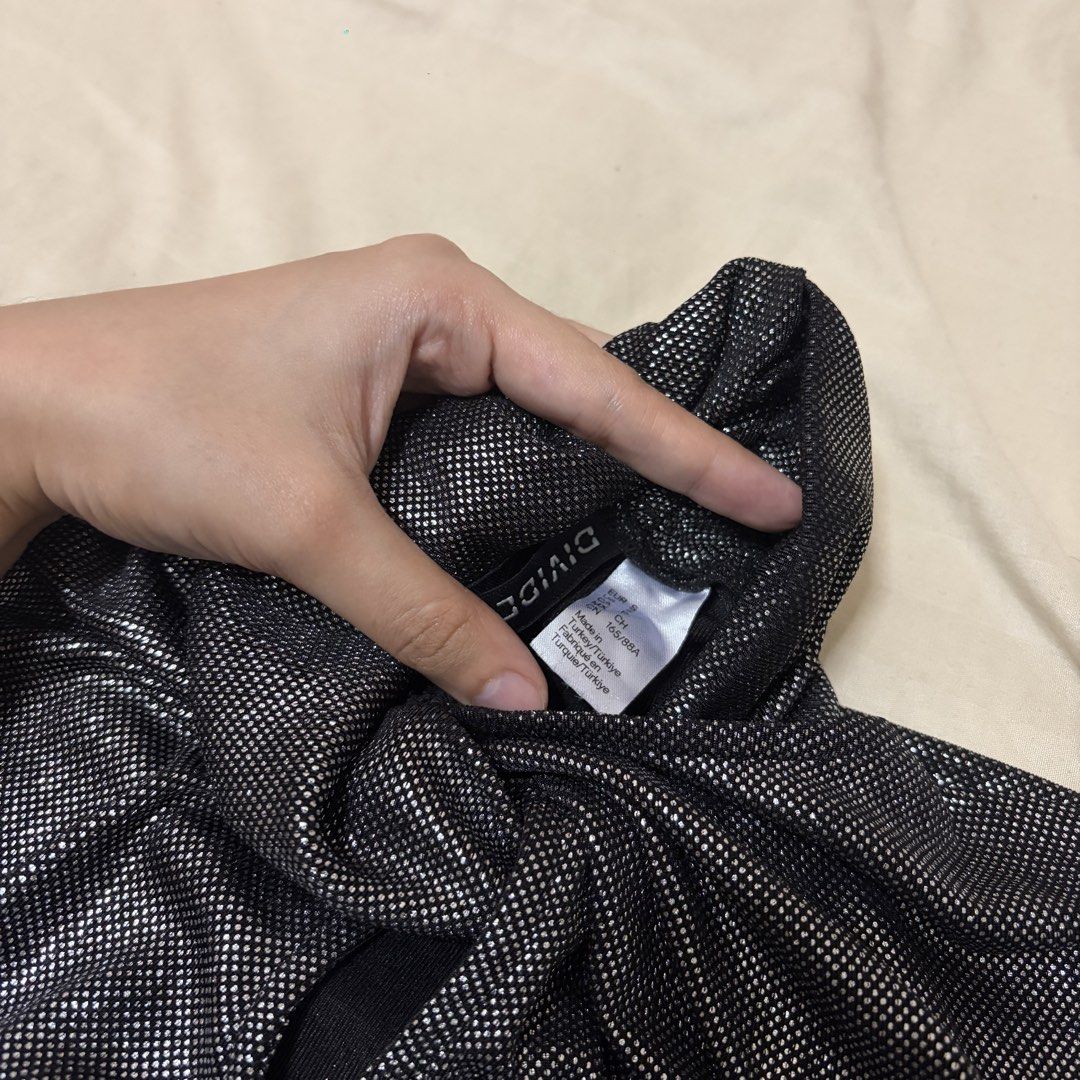 H&M Divided Metallic Shimmer Long Sleeve Top (Category: Longsleeves) located in Mandaluyong City. Submitted by afterceej (Listing ID 1466473761, Image 2). Description: - Brand: H&M Divided - Color: Black and silver with metallic shimmer - Size: EUR 34 / 165/88A - Design: Long sleeves, high twisted neckline, and front keyhole cutout - Fabric: Textured glitter dot pattern all over - Condition: Great piece for parties and night outs -USED ONCE 📍 Ma