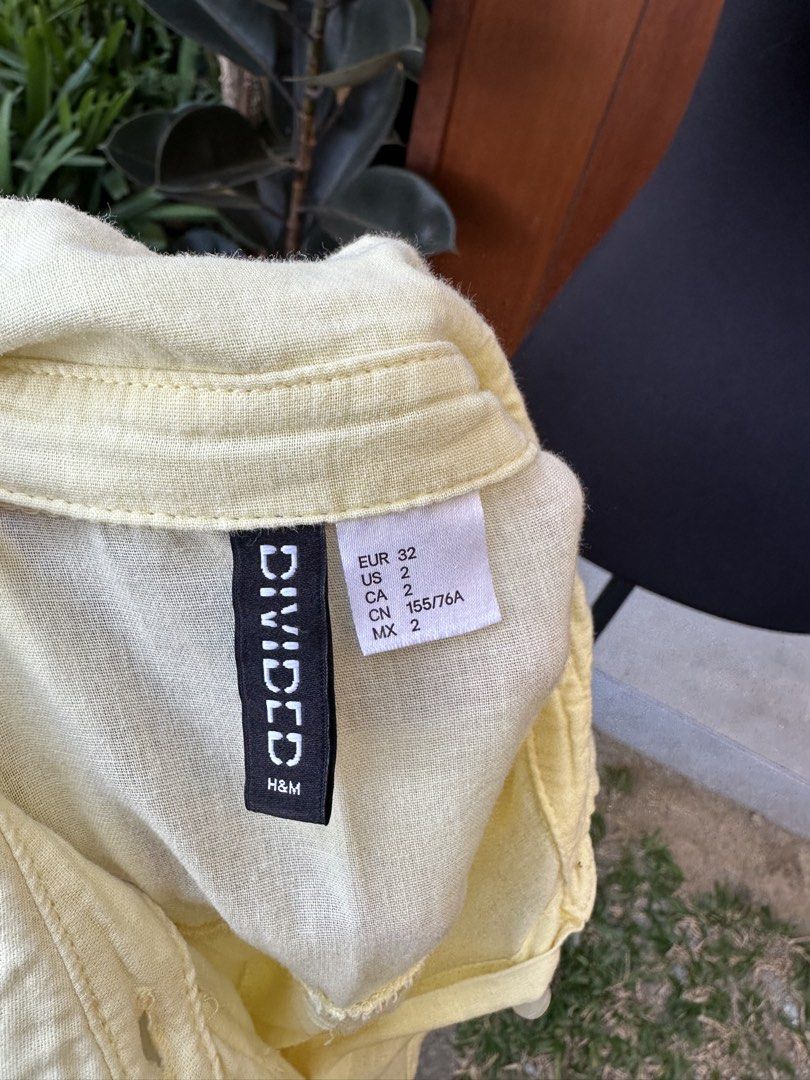 H&M Divided Yellow Long Sleeve Button Down Shirt - (Category: Longsleeves) located in Bulacan. Submitted by thriftbagcollections (Listing ID 1466360529, Image 2). Description: - Brand: H&M Divided - Color: Bright Yellow - Size: EUR 32 / US 2 (Fits Small to Medium) - Features: Long sleeves, classic collar, single chest pocket - Fabric: Lightweight, perfect for layering or wearing solo - Condition: Great versatile basic for everyday outfits.