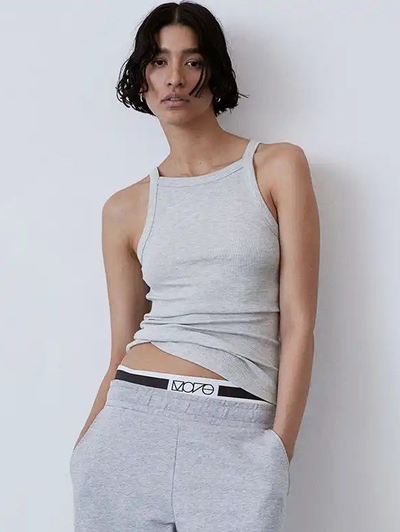 H&M Ribbed tank top (Category: Sleeveless) located in Quezon City. Submitted by uniqcollections (Listing ID 1466403277, Image 1). Description: Like new Gray color Medium size Stretchable fabric Last price posted! MOP- gcash Delivery- grab/lalamove/j&t.