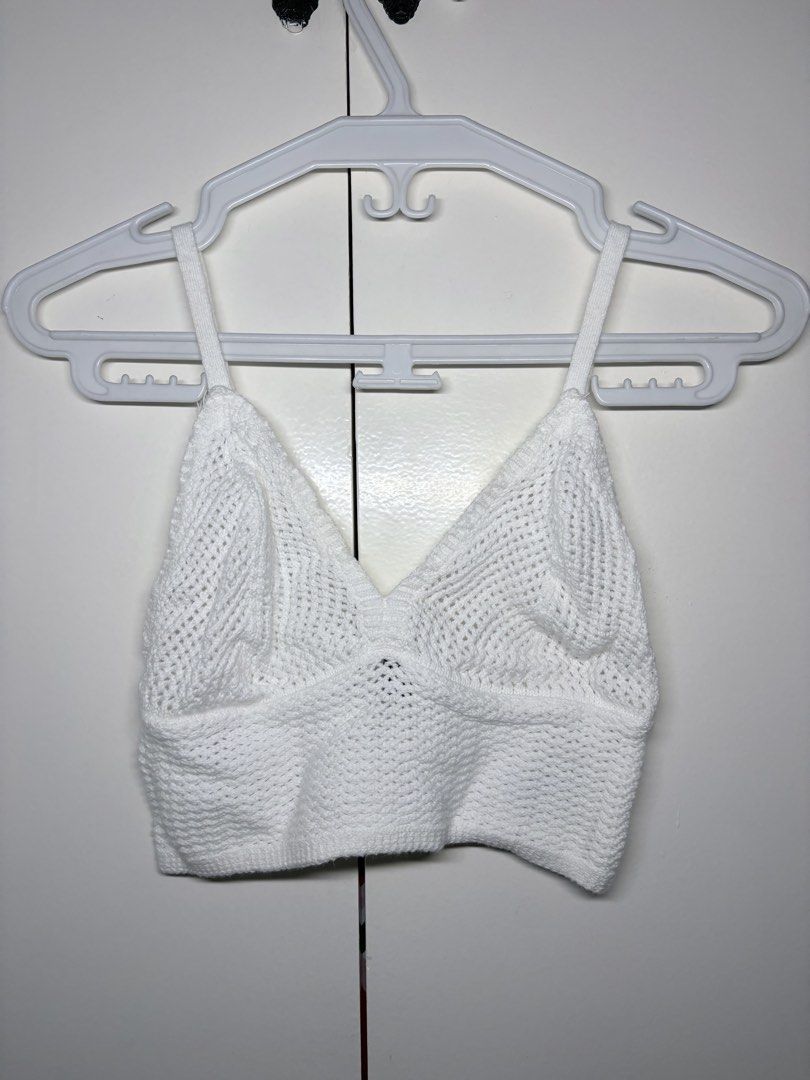 White Crochet Bralette Crop Top (Category: Sleeveless) located in Paranaque City. Submitted by honeykkkk (Listing ID 1466487407, Image 1). Description: • Details: V-neckline, textured open-knit / crochet-style weave pattern, flattering bust seam details, wide elasticated lower band for support, and adjustable shoulder straps. Perfect as a summer beach bralette, festival top, or for layering under blazers and open shirts. • Condition: Excellent co