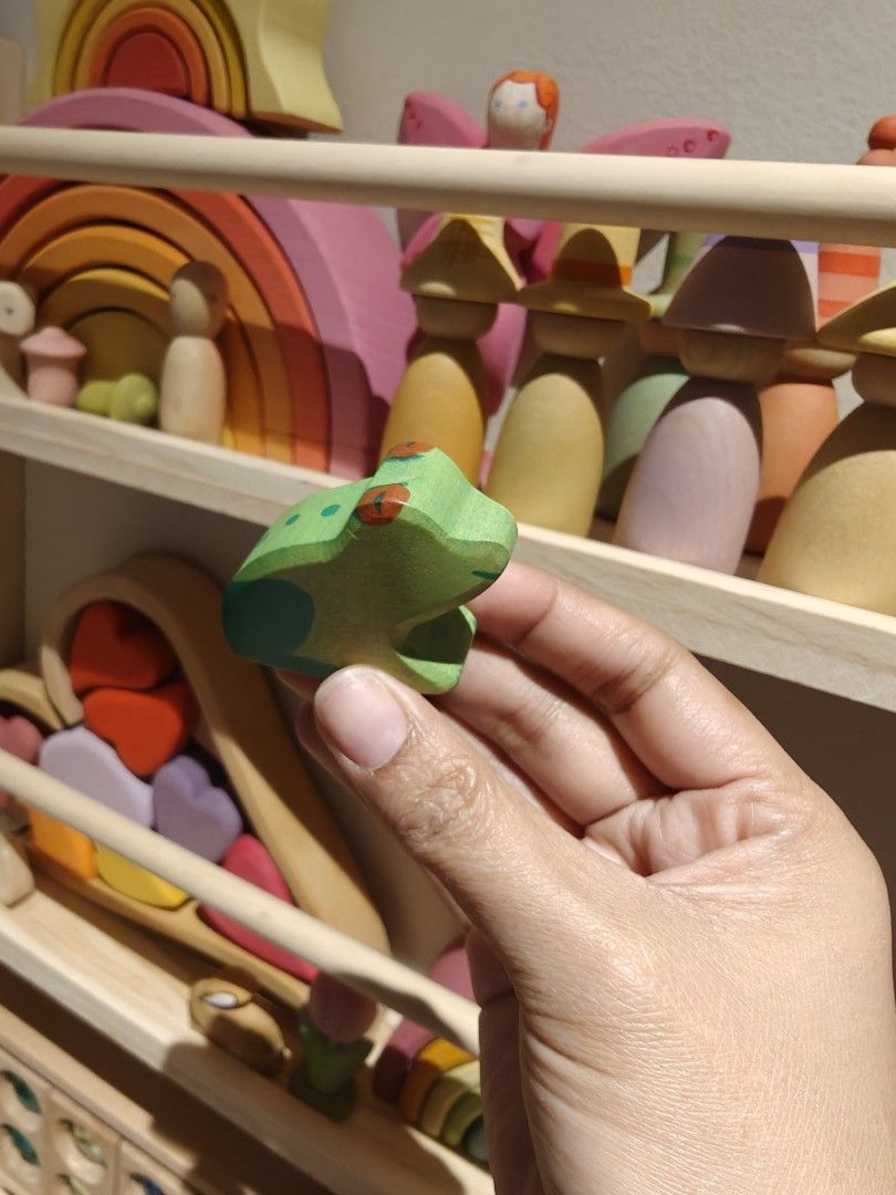 HOLZTIGER TOY (Category: Figurines & Statues) located in Manila. Submitted by asianbutte89964 (Listing ID 1466505509, Image 1). Description: - Set includes 2 handmade wooden figurines: a green frog and a brown sheep - Features lovely painted details and smooth, child-friendly edges - FROG 650 - BABY SHEEP 700.