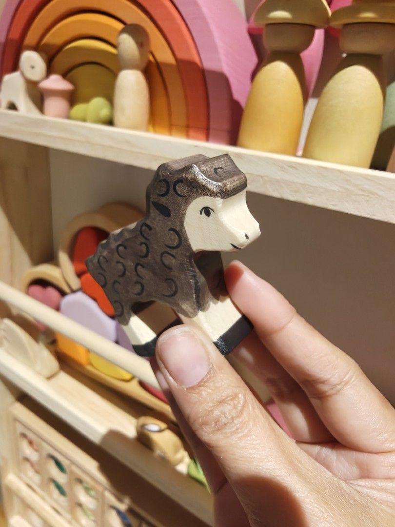 HOLZTIGER TOY (Category: Figurines & Statues) located in Manila. Submitted by asianbutte89964 (Listing ID 1466505509, Image 2). Description: - Set includes 2 handmade wooden figurines: a green frog and a brown sheep - Features lovely painted details and smooth, child-friendly edges - FROG 650 - BABY SHEEP 700.