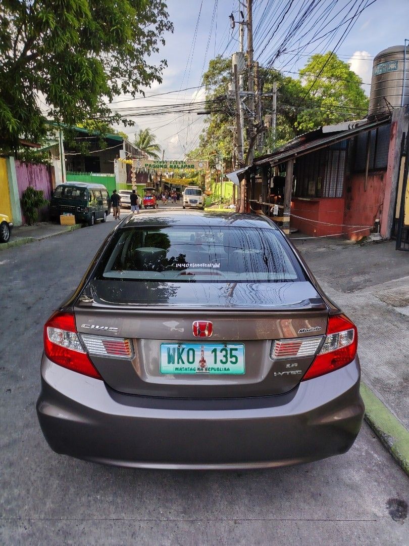Honda Civic 1.8 FB Auto (Category: Used Cars) located in Manila. Submitted by 51east (Listing ID 1466537013, Image 3). Description: Honda Civic Fb 2012 "Thailand Modulo Version" 345K negotiable Open For Swap - Automatic Transmission ( Paddle shifter) - Mileage: 88k Orig not tampered - 1.8 Engine with Eco mode (same consumption ng City 1.5 Transformer) - Casa Maintained - Thick Tires 90% ( Michelin All the Way ) - K-Sport Coil over (Maganda tindig