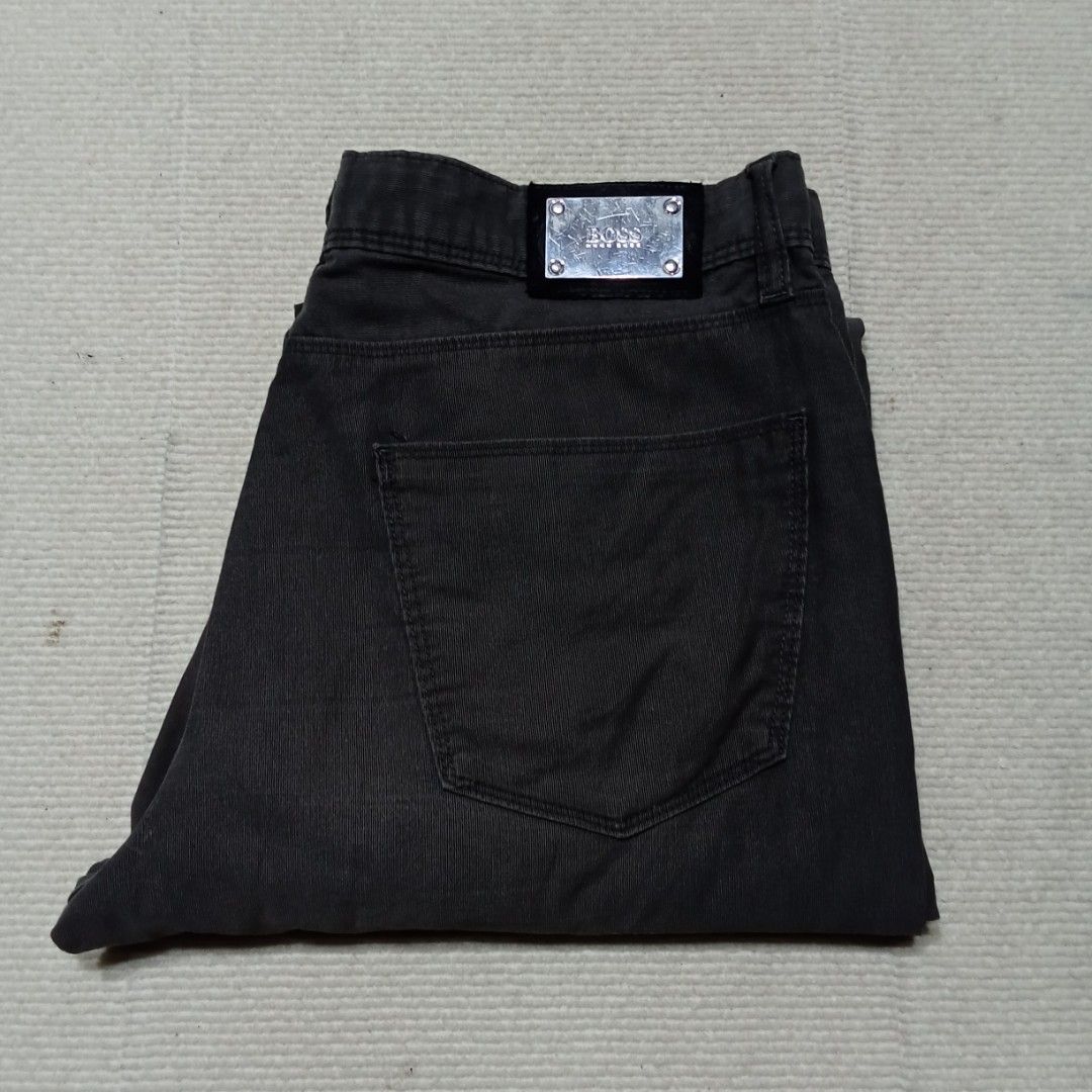 HUGO BOSS DARK GREY PANTS (Category: Jeans) located in Irosin. Submitted by jamilflor (Listing ID 1466500329, Image 2). Description: HUGO BOSS PANTS no major issue Size 34 Length 42 Excellent condition - message me!.