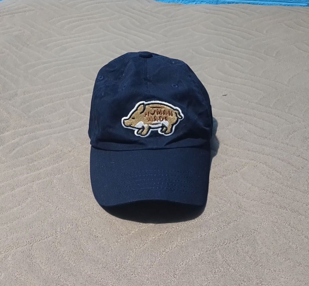 🔥Human Made🔥 (Category: Activewear) located in Cadiz. Submitted by jcthrifting (Listing ID 1466373306, Image 1). Description: 🔥Human Made🔥 Dadhat Cap🧢 feat. distinctive embroided Pig graphic on the front fresh from bale like new condi no issue 📩.