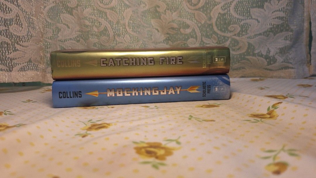 Hunger Games - Catching Fire & Mockingjay (Category: Storybooks) located in Manila. Submitted by roy.vicencio_140 (Listing ID 1466506521, Image 3). Description: Catching Fire - 500 Mockingjay - 400.