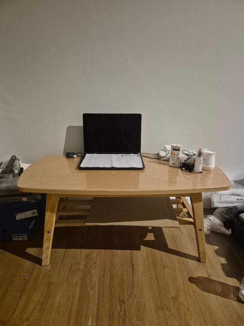 Ikea tea table (Category: Tables & Sets) located in Caloocan City. Submitted by wayne.rhee (Listing ID 1466451290, Image 1). Description: 1000 x 500 x 420 No issue Location : Solstice tower 2, Makati - Style: Minimalist light wood coffee table - Design: Rounded corners and stylish angled legs - Storage: Includes a convenient lower shelf - Build: Sturdy and durable construction - Ideal for: Living rooms or study spaces.