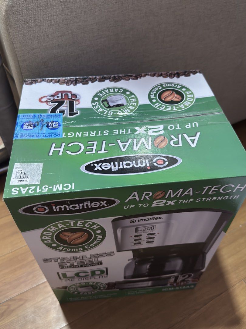Imarflex Aroma-Tech 12 Cups Coffee Maker ICM-512AS (Category: Coffee Machines & Makers) located in Manila. Submitted by asfernandez30 (Listing ID 1466401967, Image 2). Description: - Brand new and factory sealed - 12-cup capacity with thermo-glass carafe - Aroma-Tech control for up to 2x brewing strength - LCD time display and keep-warm heater plate - Automatic drip function with built-in cord storage - Energy-efficient 900 watts with sleek stain