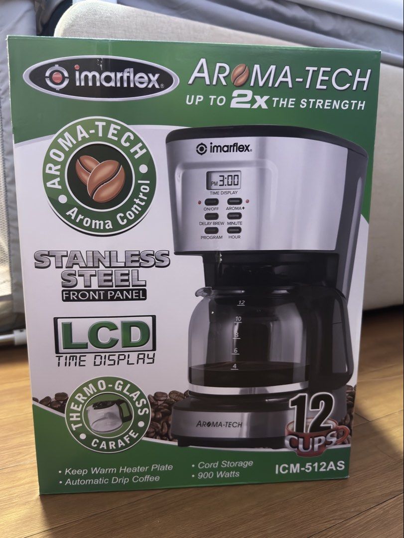 Imarflex Aroma-Tech 12 Cups Coffee Maker ICM-512AS (Category: Coffee Machines & Makers) located in Manila. Submitted by asfernandez30 (Listing ID 1466401967, Image 1). Description: - Brand new and factory sealed - 12-cup capacity with thermo-glass carafe - Aroma-Tech control for up to 2x brewing strength - LCD time display and keep-warm heater plate - Automatic drip function with built-in cord storage - Energy-efficient 900 watts with sleek stain