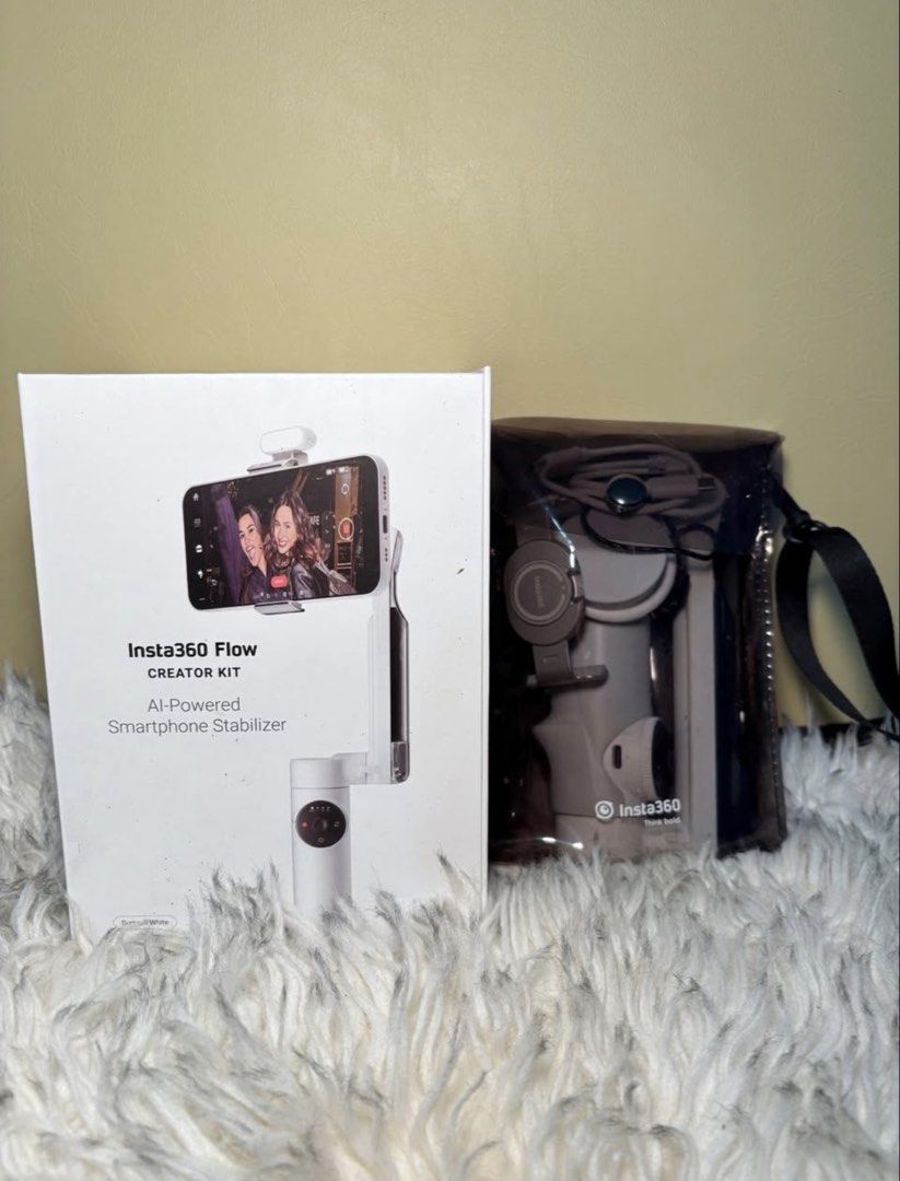 Insta360 Flow Creator Kit (Category: Gimbals & Stabilizers ) located in Ajuy. Submitted by islaorchid (Listing ID 1466537278, Image 1). Description: - Item: Insta360 Flow Creator Kit (Summit White) - Condition: Excellent, comes with original box - Features: AI-powered smartphone gimbal and stabilizer for ultra-smooth videos - Ideal For: Vlogging, mobile filmmaking, and content creation - Inclusion: Original protective pouch, cables, and complete 