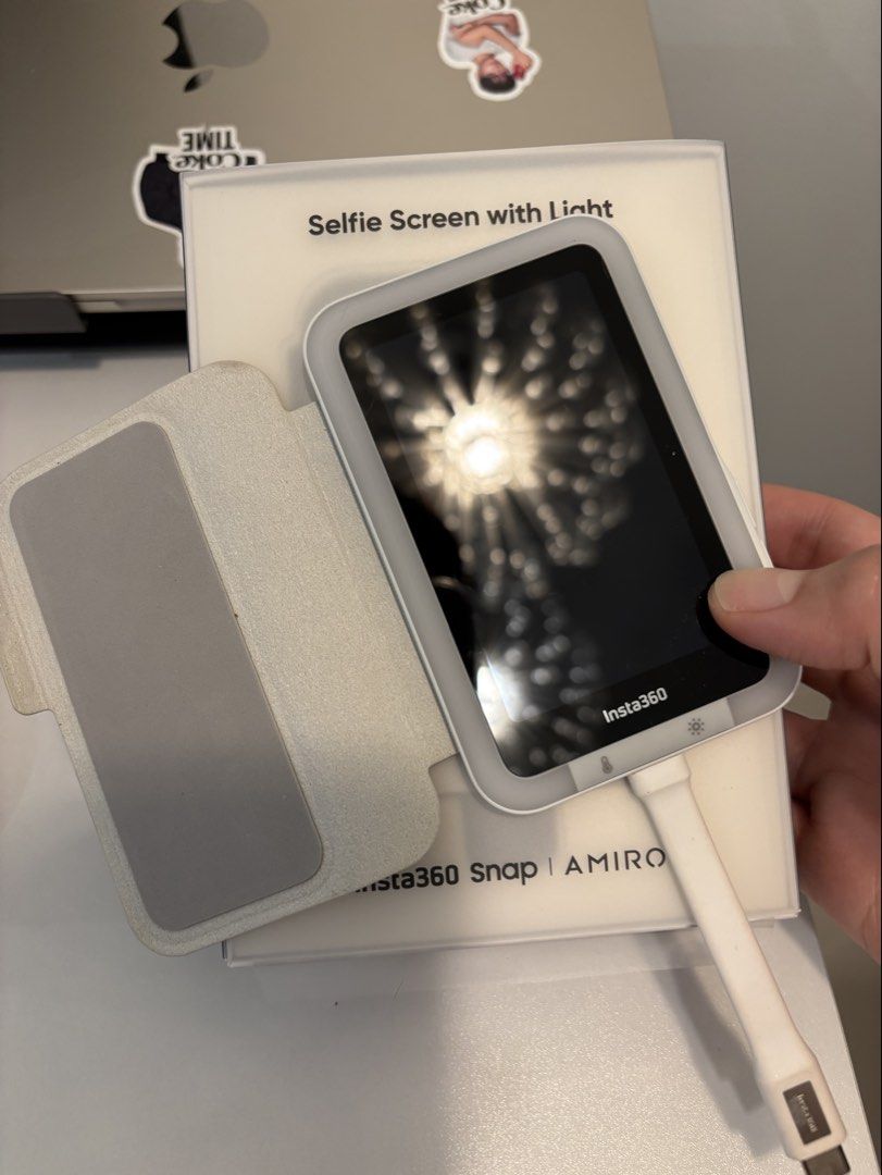 Insta360 Selfie Screen with Light (Category: Other Gadgets) located in Taguig. Submitted by mommae_preloved (Listing ID 1466435680, Image 1). Description: - Used during my Vietnam trip. With box, manual. Just plug and play RFS: Decluttering Brand: Insta360 x AMIRO (Snap Selfie Screen with Light) - Features real-time rear camera preview for ultra-sharp selfies and vlogging - Built-in light with adjustable color temperature and brightness levels - 